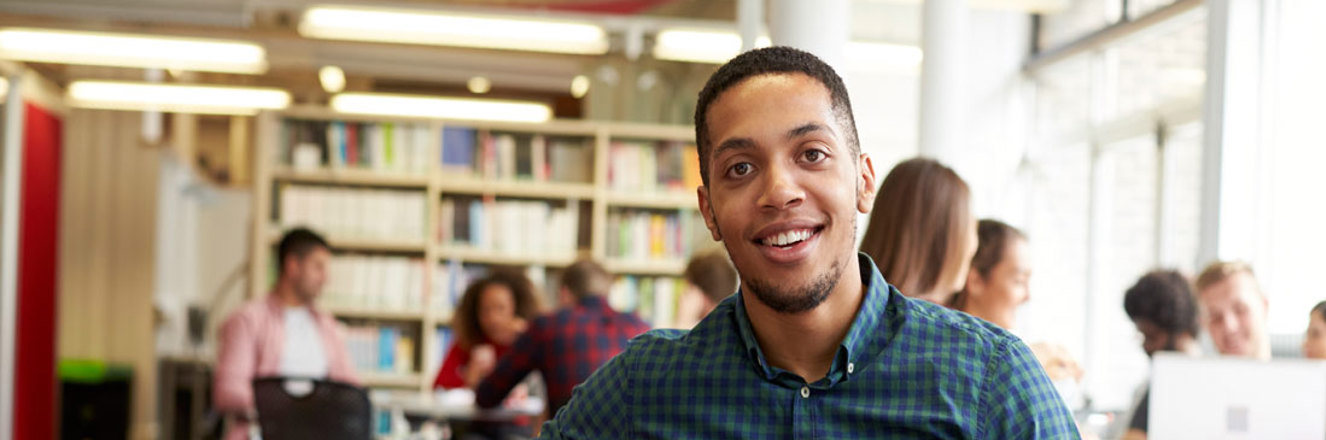 University student working in library