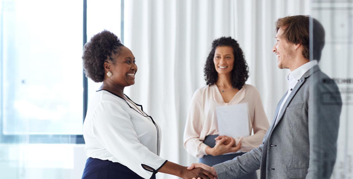 Person shaking hands with interviewer