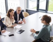 Interviewee during a job interview with a panel of 3 interviewers