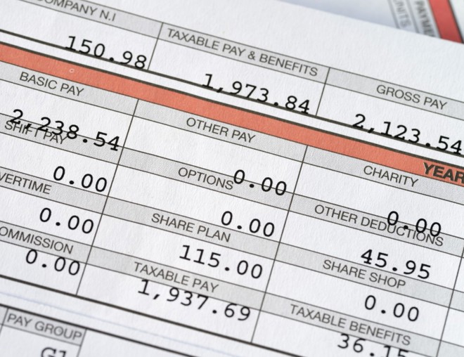 A pay stub showing a worker's pay and deductions.