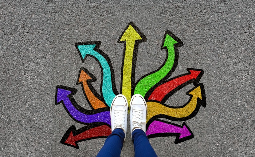 Feet on top of arrows pointing in multiple directions. 