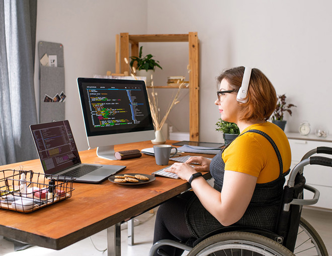Coder in Wheelchair Working From Home
