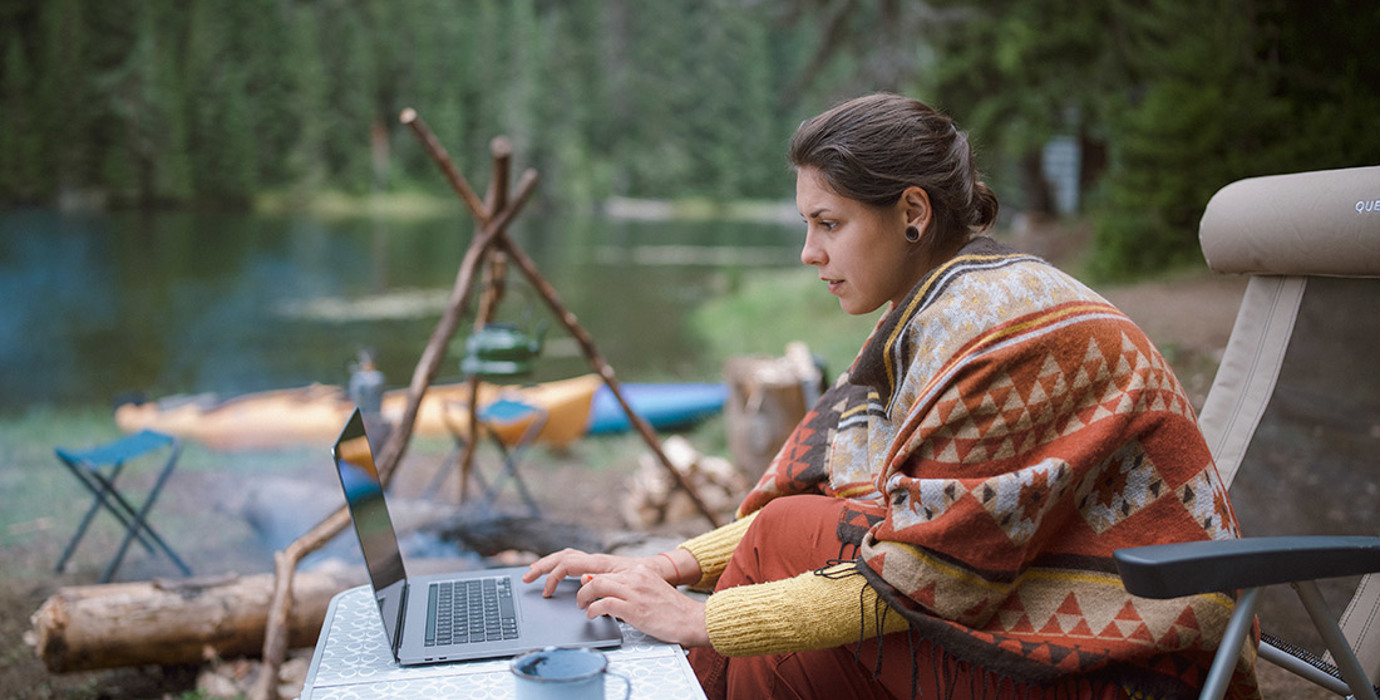 Camper working at laptop