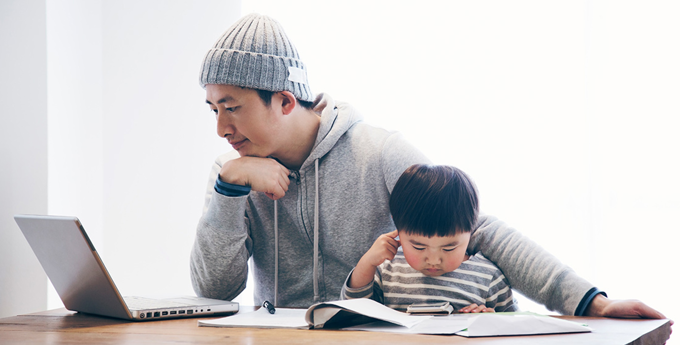 Father with son working from home