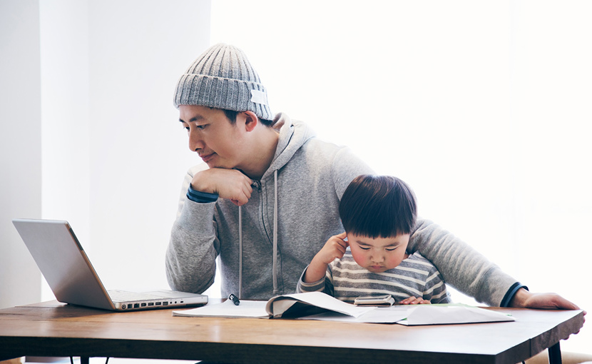Father with son working from home
