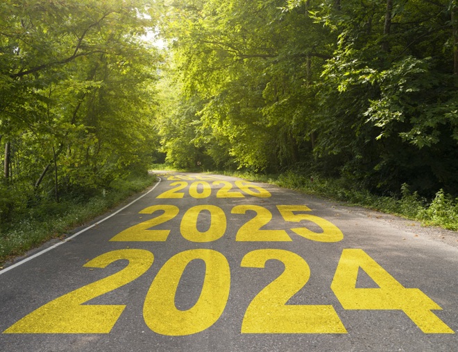 The years 2024, 2025, and 2026 shown consecutively on a paved road. 