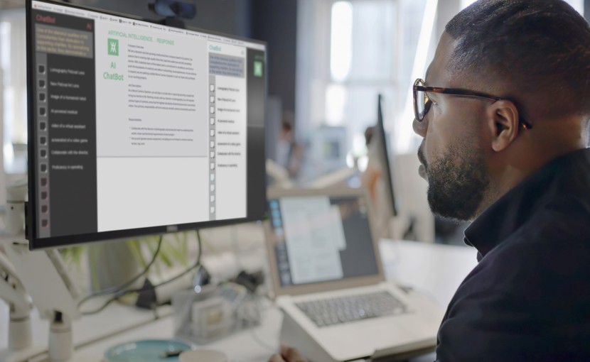Person using desktop computer to access generative AI software.