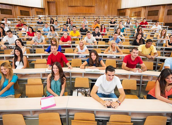 Large group of students in a university classroom