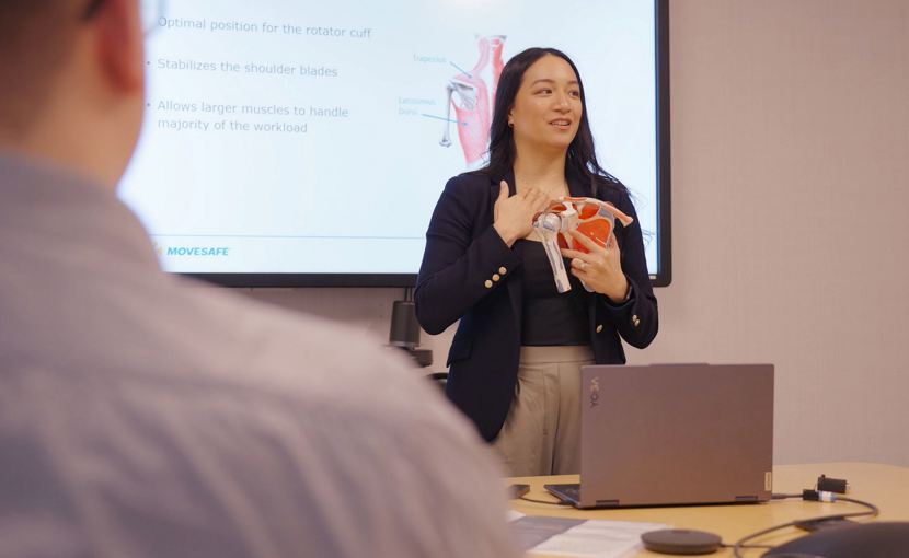 ergonomist with anatomy model