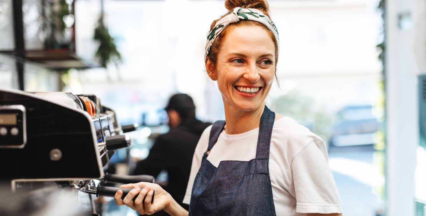 A Barista preparing coffee.